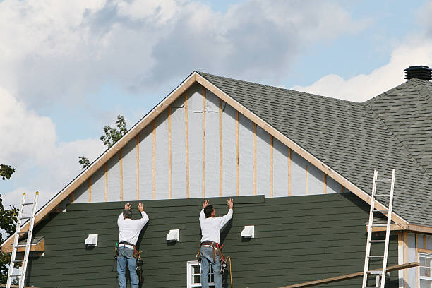 Professional Emergency Siding Repair technician working in Moreland, GA
